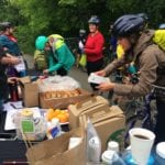 骑自行车的人在 e8体育 Bike to Work Day Pit Stop 享受免费优惠