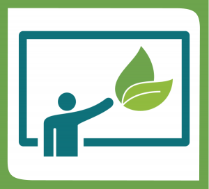 Showcasing sustainability. A person in front of a board with a leaf on it.