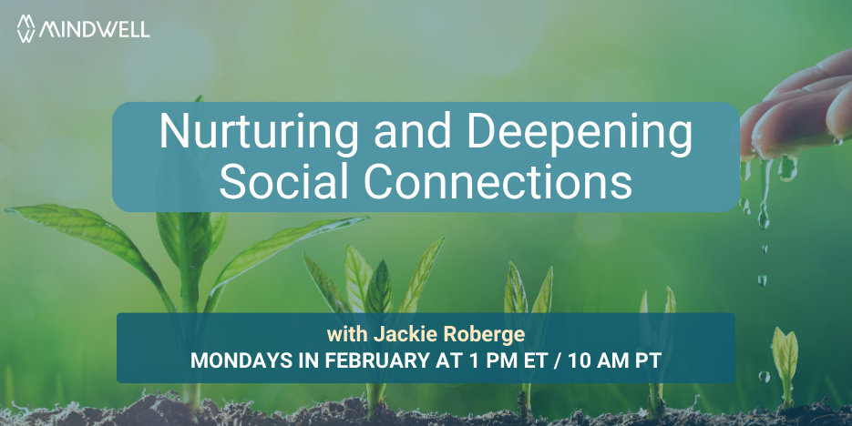 水滴从指尖落到从土壤中发芽的大小不一的小植物上。