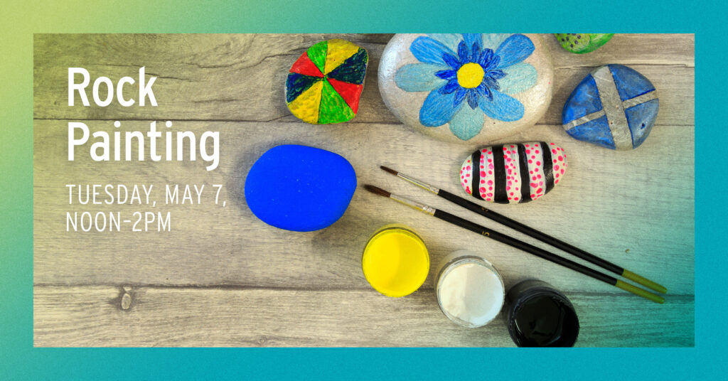 用两把画笔和三个小容器的油漆绘制的不同大小的岩石。